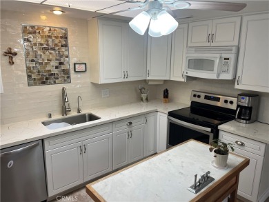 Expanded corner unit on a beautiful greenbelt!  This fully on Leisure World Seal Beach Golf Course in California - for sale on GolfHomes.com, golf home, golf lot