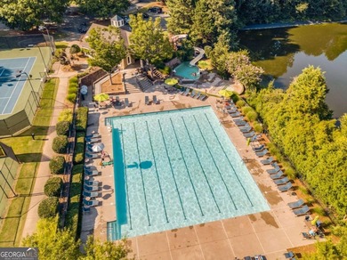 This three-sided brick traditional beauty delivers space, style on Polo Golf and Country Club in Georgia - for sale on GolfHomes.com, golf home, golf lot