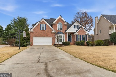 This three-sided brick traditional beauty delivers space, style on Polo Golf and Country Club in Georgia - for sale on GolfHomes.com, golf home, golf lot