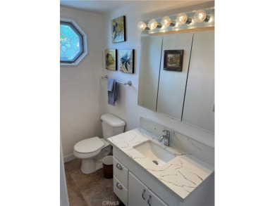 Expanded corner unit on a beautiful greenbelt!  This fully on Leisure World Seal Beach Golf Course in California - for sale on GolfHomes.com, golf home, golf lot