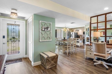 Experience stunning golf course views from your private screened on Quail Ridge Golf Course and Country Club in Florida - for sale on GolfHomes.com, golf home, golf lot