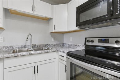 Imagine starting your day with coffee on your private deck as on Seasons Ridge At Four Seasons in Missouri - for sale on GolfHomes.com, golf home, golf lot