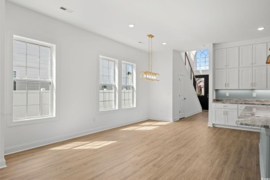Welcome to this luxurious 4-bedroom, 3.5-bath beach home! on Whispering Pines in South Carolina - for sale on GolfHomes.com, golf home, golf lot