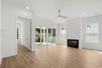 Welcome to this luxurious 4-bedroom, 3.5-bath beach home! on Whispering Pines in South Carolina - for sale on GolfHomes.com, golf home, golf lot