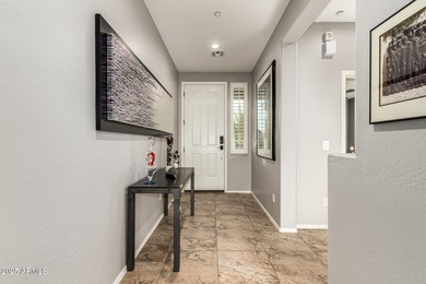 This Solar Powered Jewel Is Tucked Away In A Secluded Corner Of on Trilogy Golf Club At Vistancia in Arizona - for sale on GolfHomes.com, golf home, golf lot