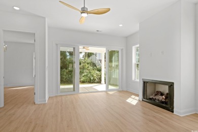 Welcome to this luxurious 4-bedroom, 3.5-bath beach home! on Whispering Pines in South Carolina - for sale on GolfHomes.com, golf home, golf lot