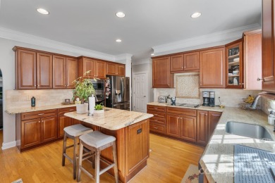 Nestled in the Birkdale community, this all-brick residence with on Birkdale Golf Club in North Carolina - for sale on GolfHomes.com, golf home, golf lot