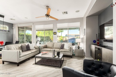 This Solar Powered Jewel Is Tucked Away In A Secluded Corner Of on Trilogy Golf Club At Vistancia in Arizona - for sale on GolfHomes.com, golf home, golf lot