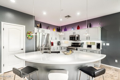 This Solar Powered Jewel Is Tucked Away In A Secluded Corner Of on Trilogy Golf Club At Vistancia in Arizona - for sale on GolfHomes.com, golf home, golf lot