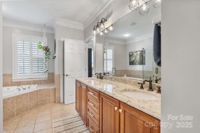 Nestled in the Birkdale community, this all-brick residence with on Birkdale Golf Club in North Carolina - for sale on GolfHomes.com, golf home, golf lot