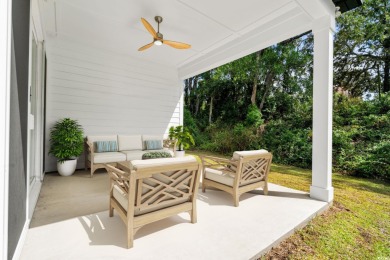 Welcome to this luxurious 4-bedroom, 3.5-bath beach home! on Whispering Pines in South Carolina - for sale on GolfHomes.com, golf home, golf lot