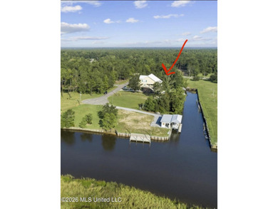 Beautiful waterfront lot offering stunning views and deep-water on Diamondhead Country Club in Mississippi - for sale on GolfHomes.com, golf home, golf lot