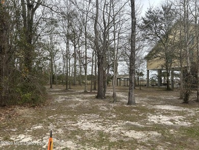 Beautiful waterfront lot offering stunning views and deep-water on Diamondhead Country Club in Mississippi - for sale on GolfHomes.com, golf home, golf lot