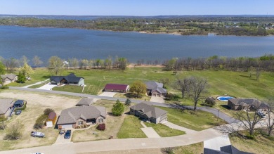 Discover this stunning 2,900 sq ft home, perfectly situated on a on Cherokee Grove Golf Club, Inc in Oklahoma - for sale on GolfHomes.com, golf home, golf lot