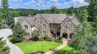 Experience unparalleled elegance in this luxury LAKEFRONT estate on The River Club in Georgia - for sale on GolfHomes.com, golf home, golf lot