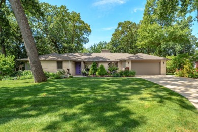 This classic all-limestone mid-century home featured in HGTV on Kalamazoo Country Club in Michigan - for sale on GolfHomes.com, golf home, golf lot