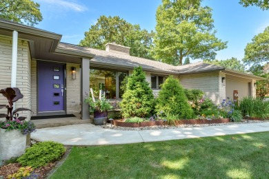 This classic all-limestone mid-century home featured in HGTV on Kalamazoo Country Club in Michigan - for sale on GolfHomes.com, golf home, golf lot