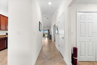 Discover maintenance-free living at its finest in this stunning on Lakewood National Golf Club in Florida - for sale on GolfHomes.com, golf home, golf lot