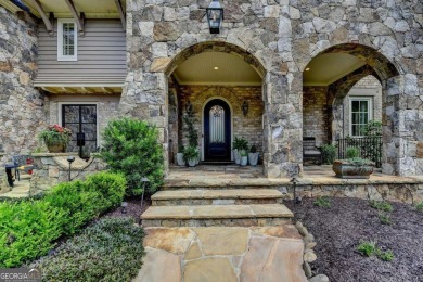 Experience unparalleled elegance in this luxury LAKEFRONT estate on The River Club in Georgia - for sale on GolfHomes.com, golf home, golf lot