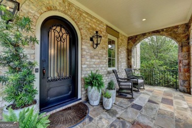 Experience unparalleled elegance in this luxury LAKEFRONT estate on The River Club in Georgia - for sale on GolfHomes.com, golf home, golf lot