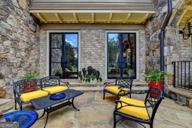 Experience unparalleled elegance in this luxury LAKEFRONT estate on The River Club in Georgia - for sale on GolfHomes.com, golf home, golf lot