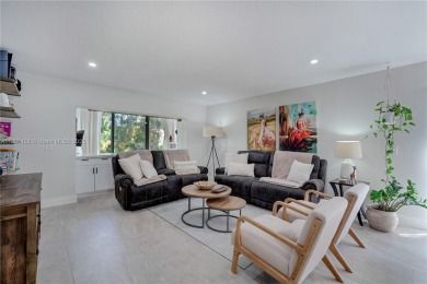 Experience luxury living in this stunning corner unit in Boca on Boca Lago Golf and Country Club in Florida - for sale on GolfHomes.com, golf home, golf lot