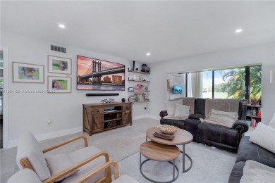 Experience luxury living in this stunning corner unit in Boca on Boca Lago Golf and Country Club in Florida - for sale on GolfHomes.com, golf home, golf lot
