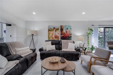 Experience luxury living in this stunning corner unit in Boca on Boca Lago Golf and Country Club in Florida - for sale on GolfHomes.com, golf home, golf lot