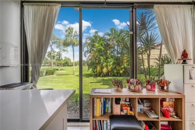 Experience luxury living in this stunning corner unit in Boca on Boca Lago Golf and Country Club in Florida - for sale on GolfHomes.com, golf home, golf lot