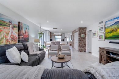 Experience luxury living in this stunning corner unit in Boca on Boca Lago Golf and Country Club in Florida - for sale on GolfHomes.com, golf home, golf lot
