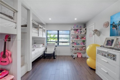Experience luxury living in this stunning corner unit in Boca on Boca Lago Golf and Country Club in Florida - for sale on GolfHomes.com, golf home, golf lot