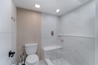 Experience luxury living in this stunning corner unit in Boca on Boca Lago Golf and Country Club in Florida - for sale on GolfHomes.com, golf home, golf lot