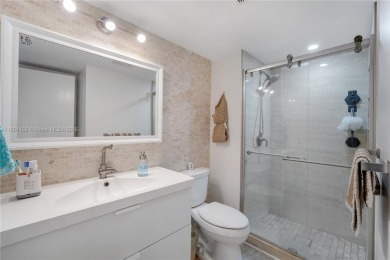 Experience luxury living in this stunning corner unit in Boca on Boca Lago Golf and Country Club in Florida - for sale on GolfHomes.com, golf home, golf lot