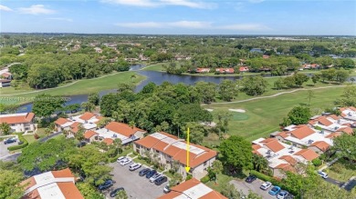 Experience luxury living in this stunning corner unit in Boca on Boca Lago Golf and Country Club in Florida - for sale on GolfHomes.com, golf home, golf lot