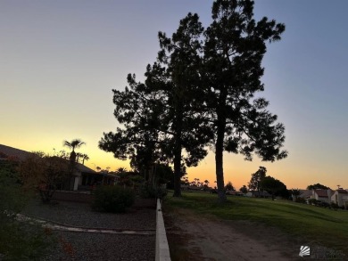 Golf Course Living, Easy Care landscaping, beautiful sunset on Mesa Del Sol Golf Club in Arizona - for sale on GolfHomes.com, golf home, golf lot