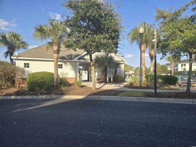 This is a lovely first floor middle unit with some nice upgrades on Barefoot Resort and Golf Club  in South Carolina - for sale on GolfHomes.com, golf home, golf lot