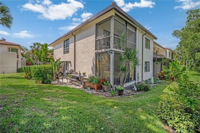 Experience luxury living in this stunning corner unit in Boca on Boca Lago Golf and Country Club in Florida - for sale on GolfHomes.com, golf home, golf lot