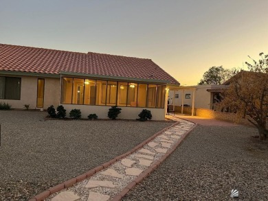 Golf Course Living, Easy Care landscaping, beautiful sunset on Mesa Del Sol Golf Club in Arizona - for sale on GolfHomes.com, golf home, golf lot