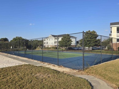 This is a lovely first floor middle unit with some nice upgrades on Barefoot Resort and Golf Club  in South Carolina - for sale on GolfHomes.com, golf home, golf lot