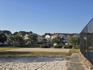 This is a lovely first floor middle unit with some nice upgrades on Barefoot Resort and Golf Club  in South Carolina - for sale on GolfHomes.com, golf home, golf lot