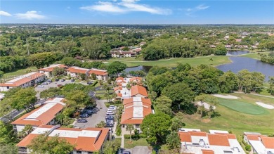 Experience luxury living in this stunning corner unit in Boca on Boca Lago Golf and Country Club in Florida - for sale on GolfHomes.com, golf home, golf lot