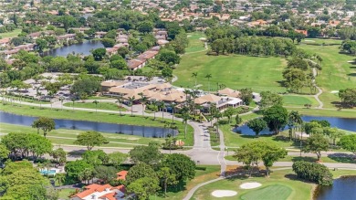 Experience luxury living in this stunning corner unit in Boca on Boca Lago Golf and Country Club in Florida - for sale on GolfHomes.com, golf home, golf lot