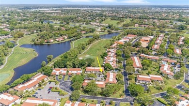 Experience luxury living in this stunning corner unit in Boca on Boca Lago Golf and Country Club in Florida - for sale on GolfHomes.com, golf home, golf lot