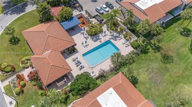 Experience luxury living in this stunning corner unit in Boca on Boca Lago Golf and Country Club in Florida - for sale on GolfHomes.com, golf home, golf lot