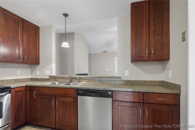 Updated and move-in ready! Beautiful 2 bedroom 2 bath unit on Kings Grant Golf and Country Club in North Carolina - for sale on GolfHomes.com, golf home, golf lot