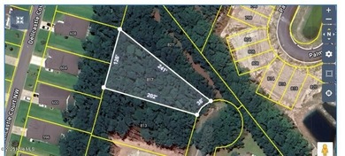 Discover the perfect place to build your coastal dream home on on Carolina Shores Golf Course in North Carolina - for sale on GolfHomes.com, golf home, golf lot