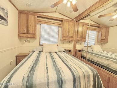 **Fully Furnished**Nestled on a large corner at the edge of on Augusta Ranch Golf Club in Arizona - for sale on GolfHomes.com, golf home, golf lot