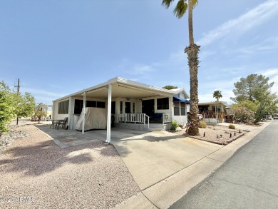 **Fully Furnished**Nestled on a large corner at the edge of on Augusta Ranch Golf Club in Arizona - for sale on GolfHomes.com, golf home, golf lot