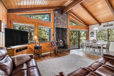 Relax and stay in this charming 3-bedroom, 2-bath cabin nestled on Pine Mountain Lake Country Club in California - for sale on GolfHomes.com, golf home, golf lot