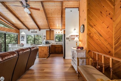 Relax and stay in this charming 3-bedroom, 2-bath cabin nestled on Pine Mountain Lake Country Club in California - for sale on GolfHomes.com, golf home, golf lot